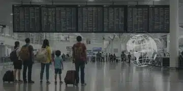 Travelers at an airport preparing for international travel under new health regulations.